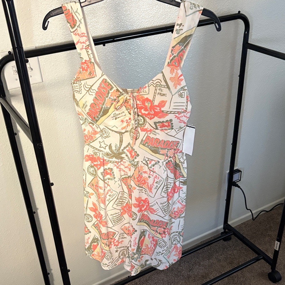 Derek Heart White Floral Graphic Romper with Coral Accents